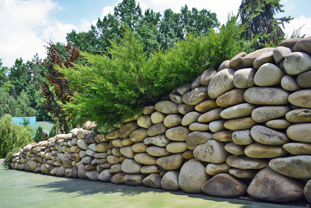 3 Things to Know About Using Large Rocks In Landscaping